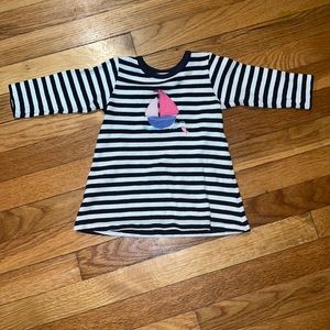 Nautical striped dress with pink boat.